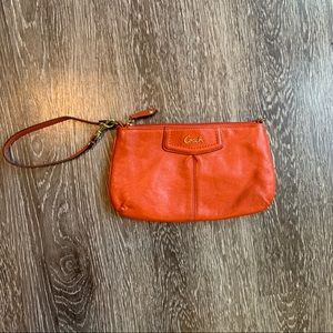 Coach wristlet with gold hardware and card slots